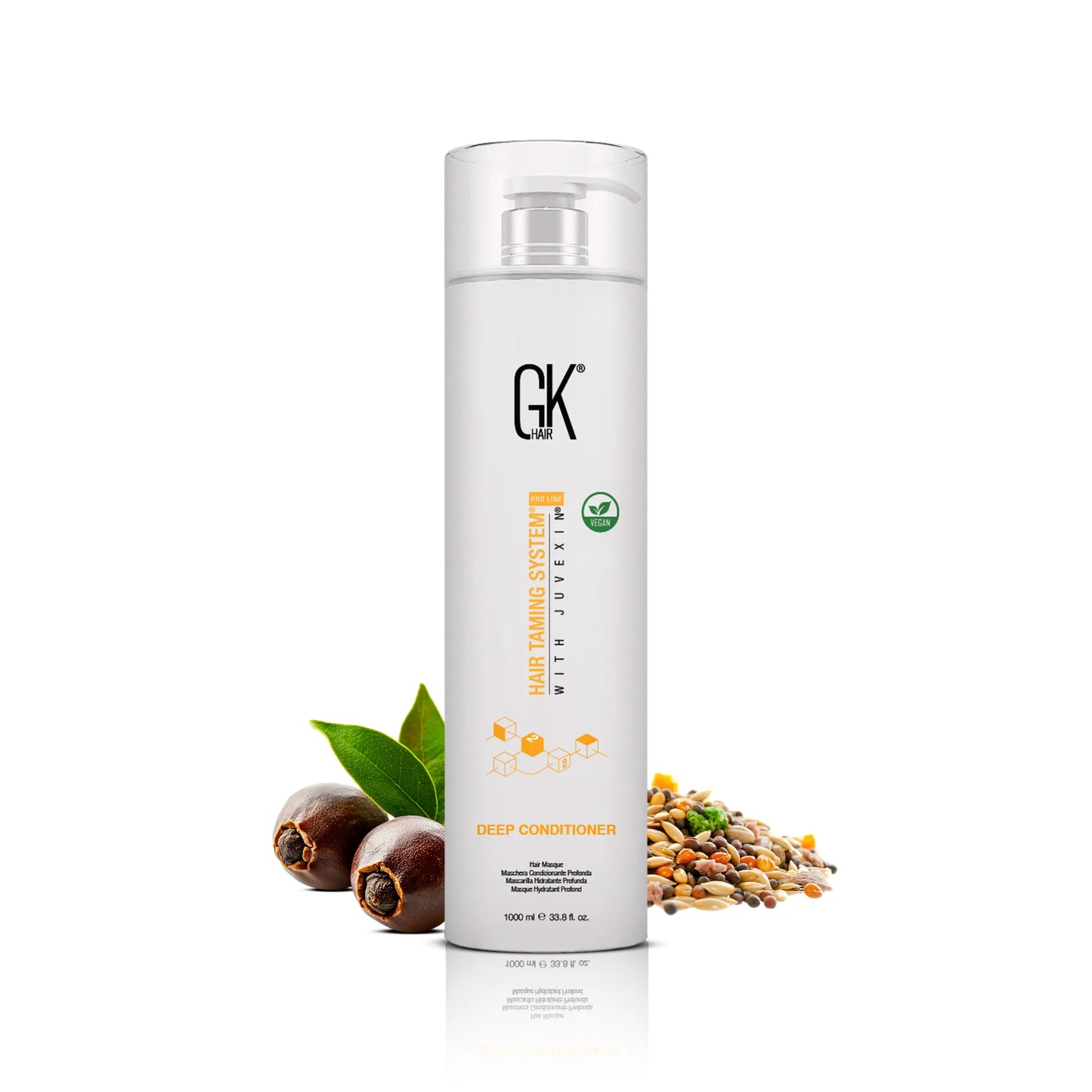 GK Hair Deep Conditioner hair masque 1000 ml white pump bottle, vegan mark, beside jojoba nuts, a green leaf and mixed seeds