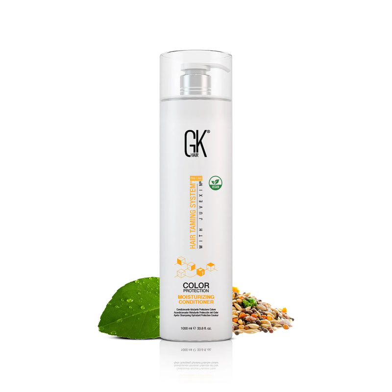 GK Hair Color Protection Moisturizing Conditioner 1000 ml white pump bottle beside a green leaf and mixed seeds