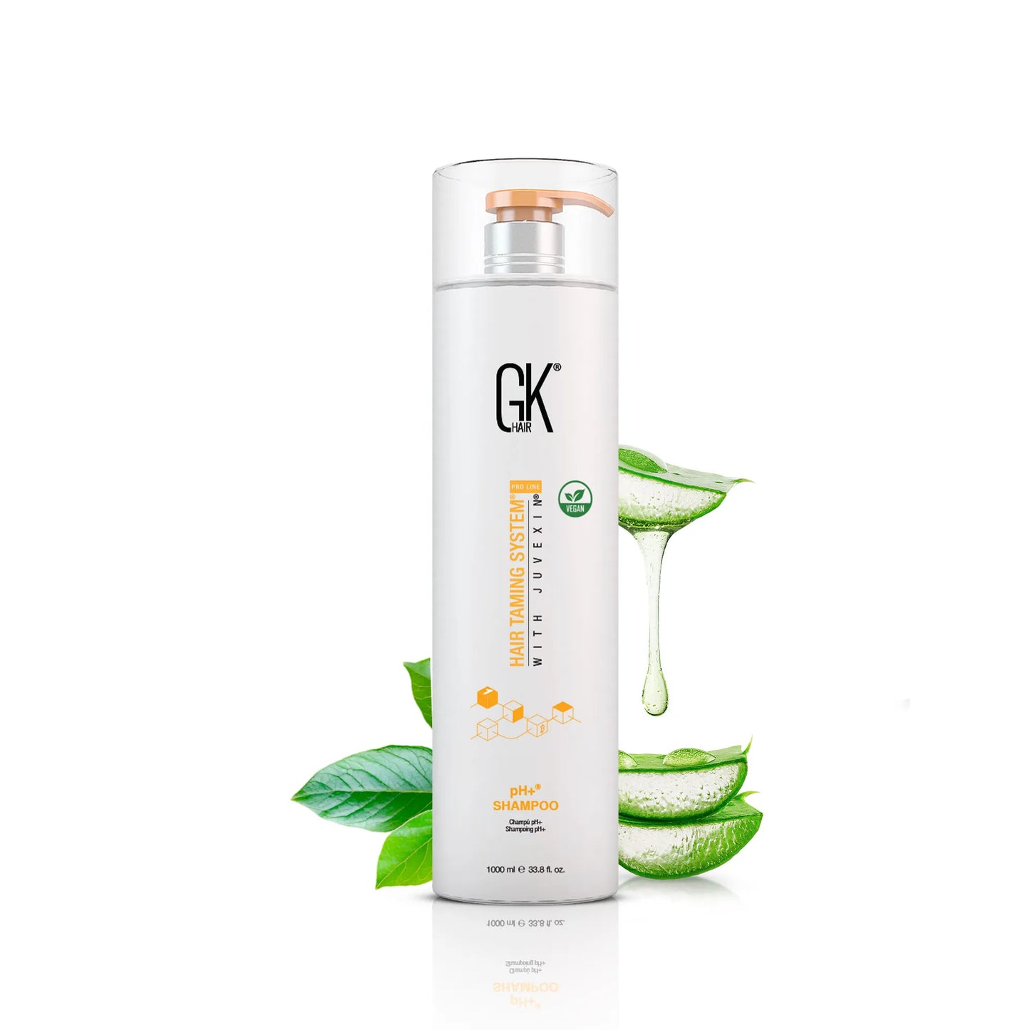 GK Hair pH+ Shampoo 1000 ml white bottle with orange pump, aloe vera leaves and dripping gel beside it