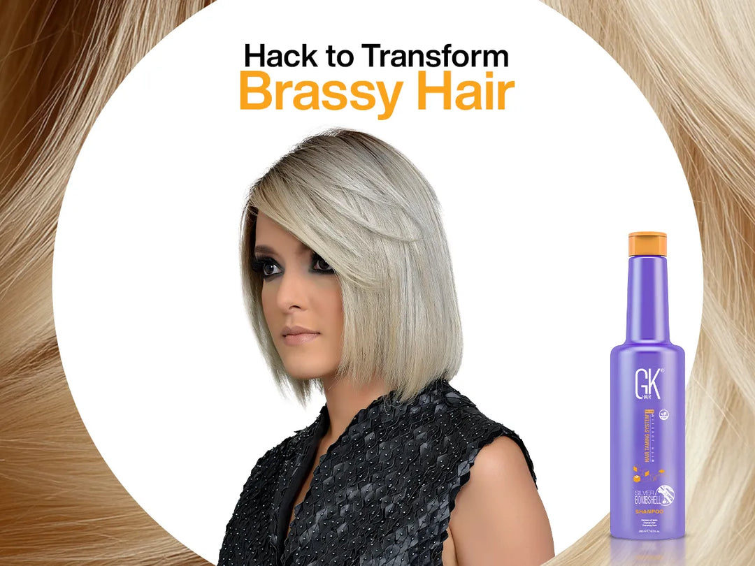 A woman with short, sleek blonde hair wearing a black top. Beside her is a bottle of GK Hair Silver Bombshell Shampoo for brassy hair.