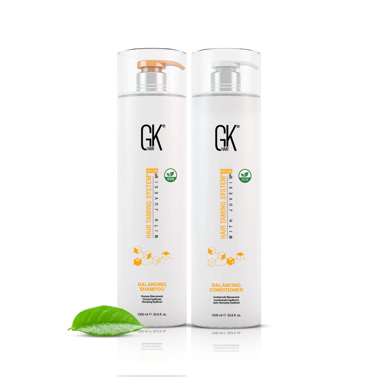 GK Hair Balancing Shampoo with orange pump beside Balancing Conditioner, both 1000 ml, with a green leaf on white