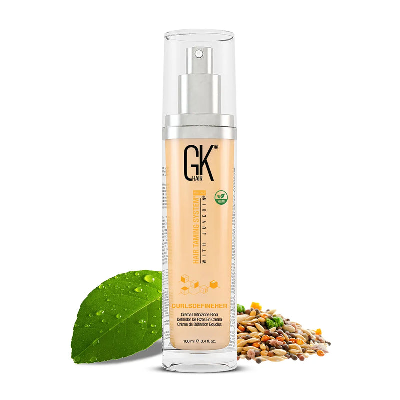 GK Hair CurlsDefineHer curl definition cream 100 ml clear pump bottle with a green leaf and mixed seeds, vegan mark