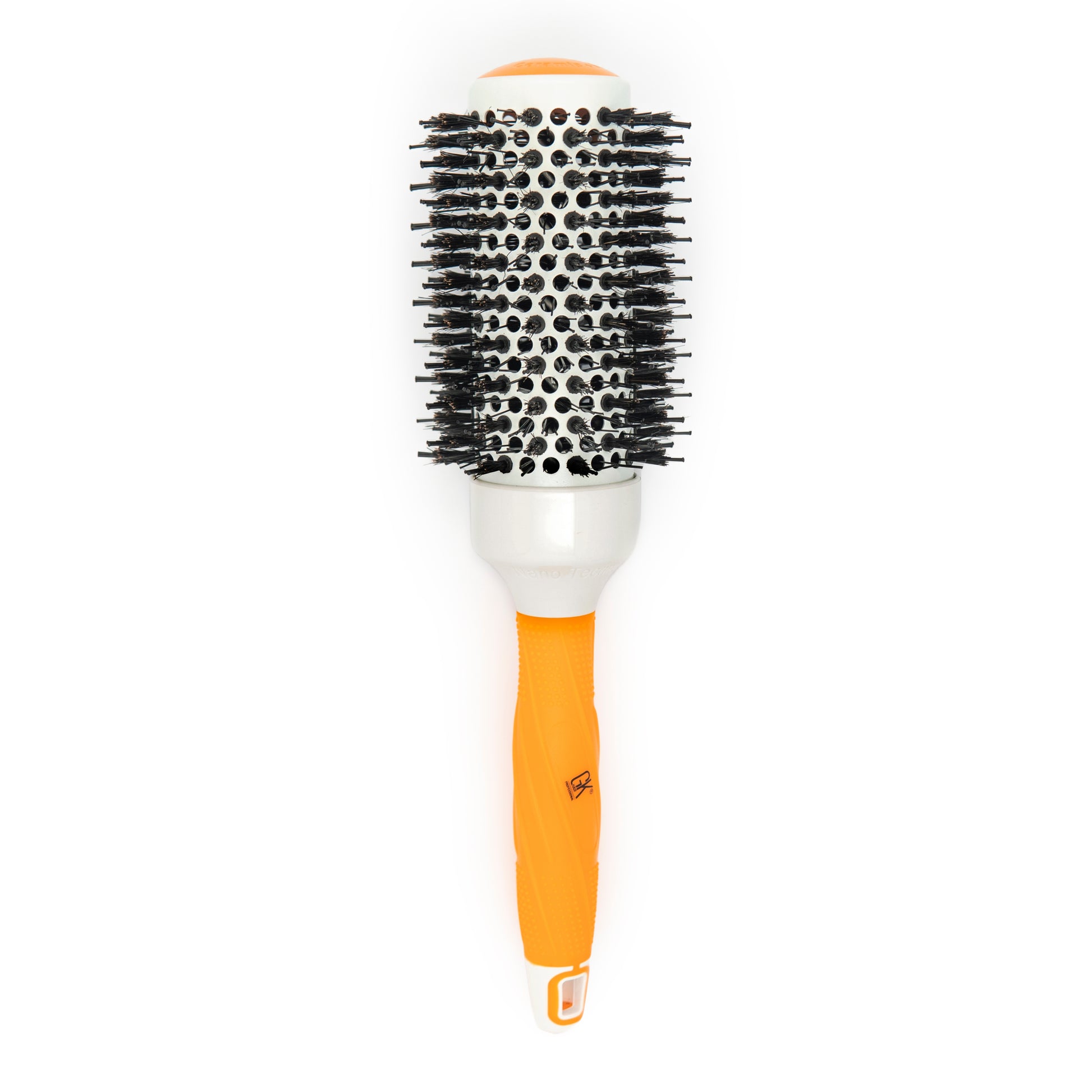 GK Hair thermal round brush standing upright, white ceramic barrel with black bristles and a ridged orange grip
