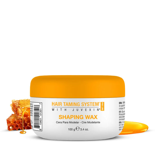 GK Hair Shaping Wax 100 g white jar with orange lid beside honeycomb and dripping honey, on a white background