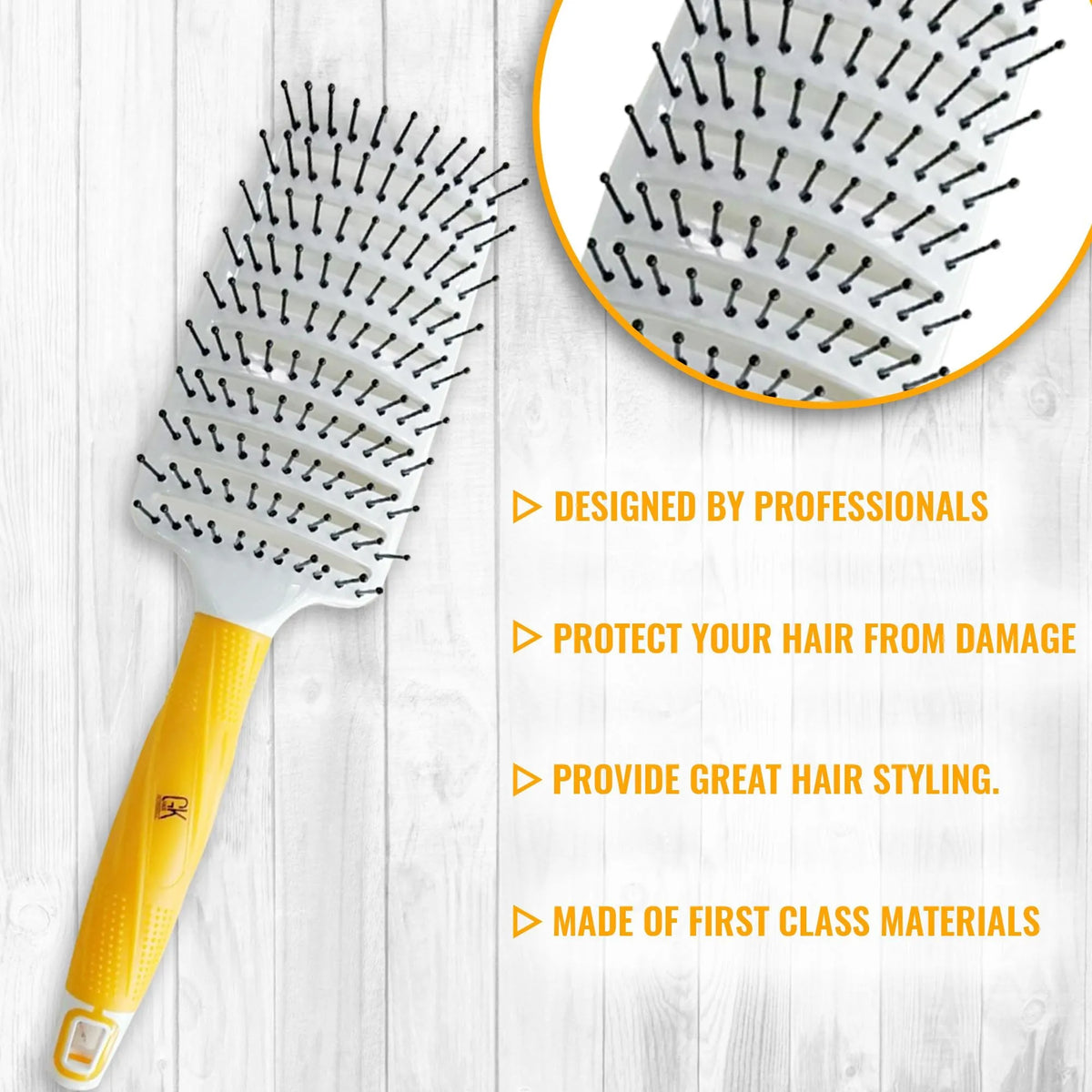 GK Hair Vent Brush 3 inch angled on white wood planks with a bristle inset, professionally designed to protect hair