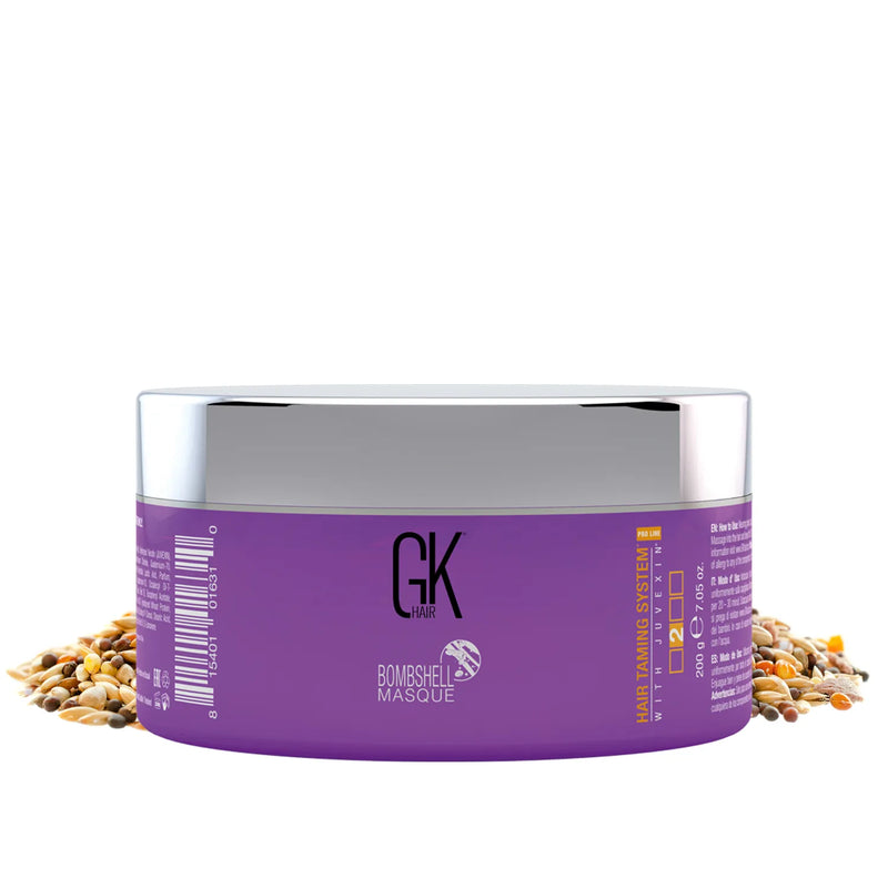 GK Hair Ultra Blonde Bombshell Masque 200 g purple jar with silver lid on a scatter of mixed seeds and grains